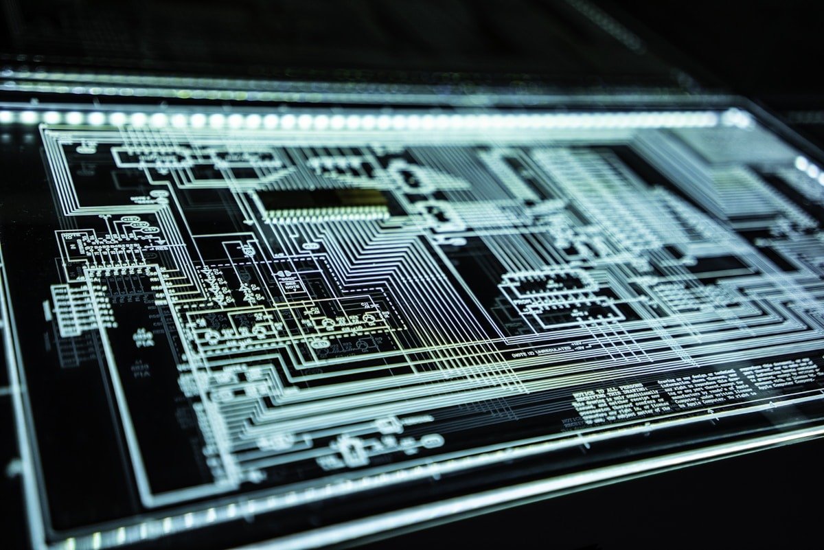 Cybersecurity operations center with critical threshold warning for AI safety