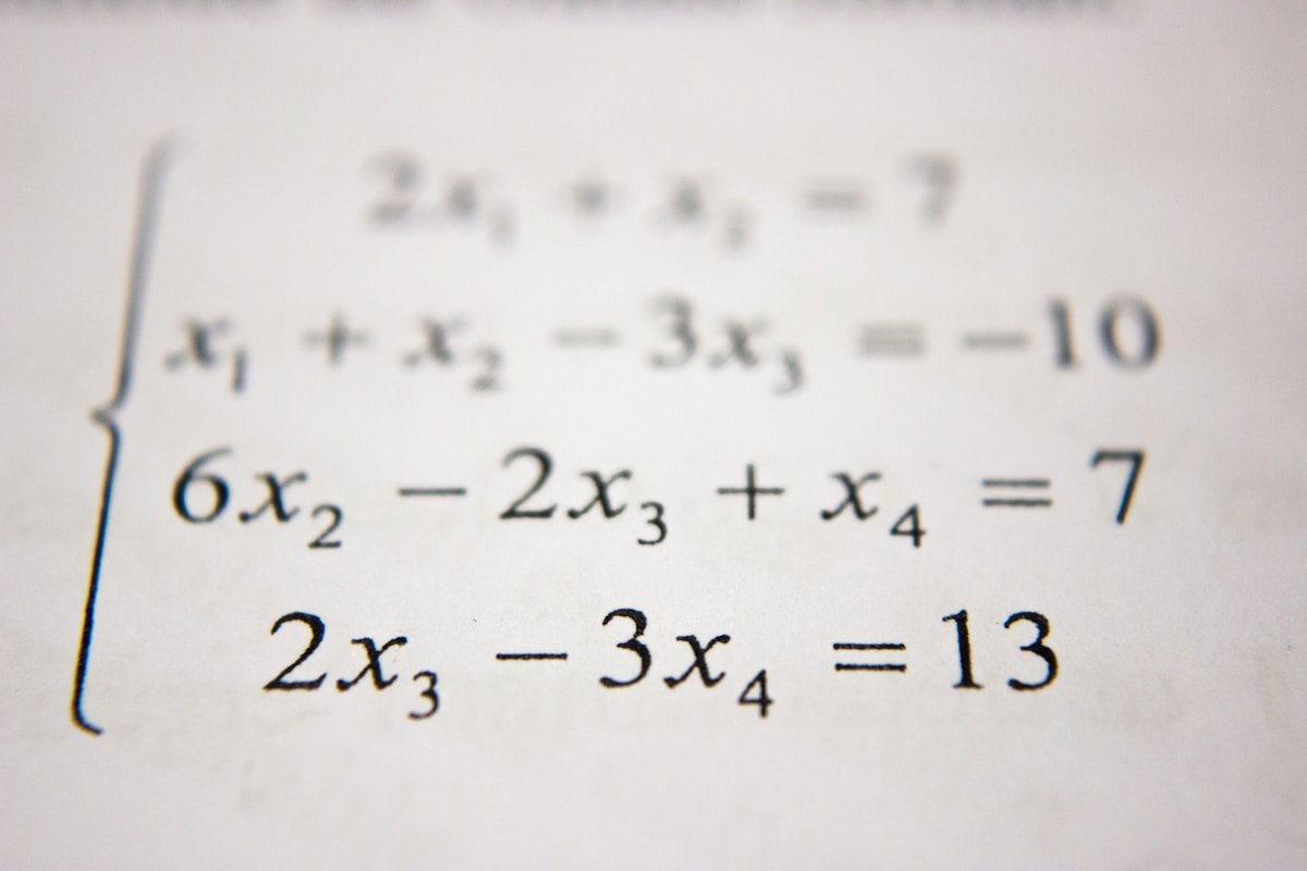 Advanced mathematics formulas on blackboard representing Lean 4 formal proofs